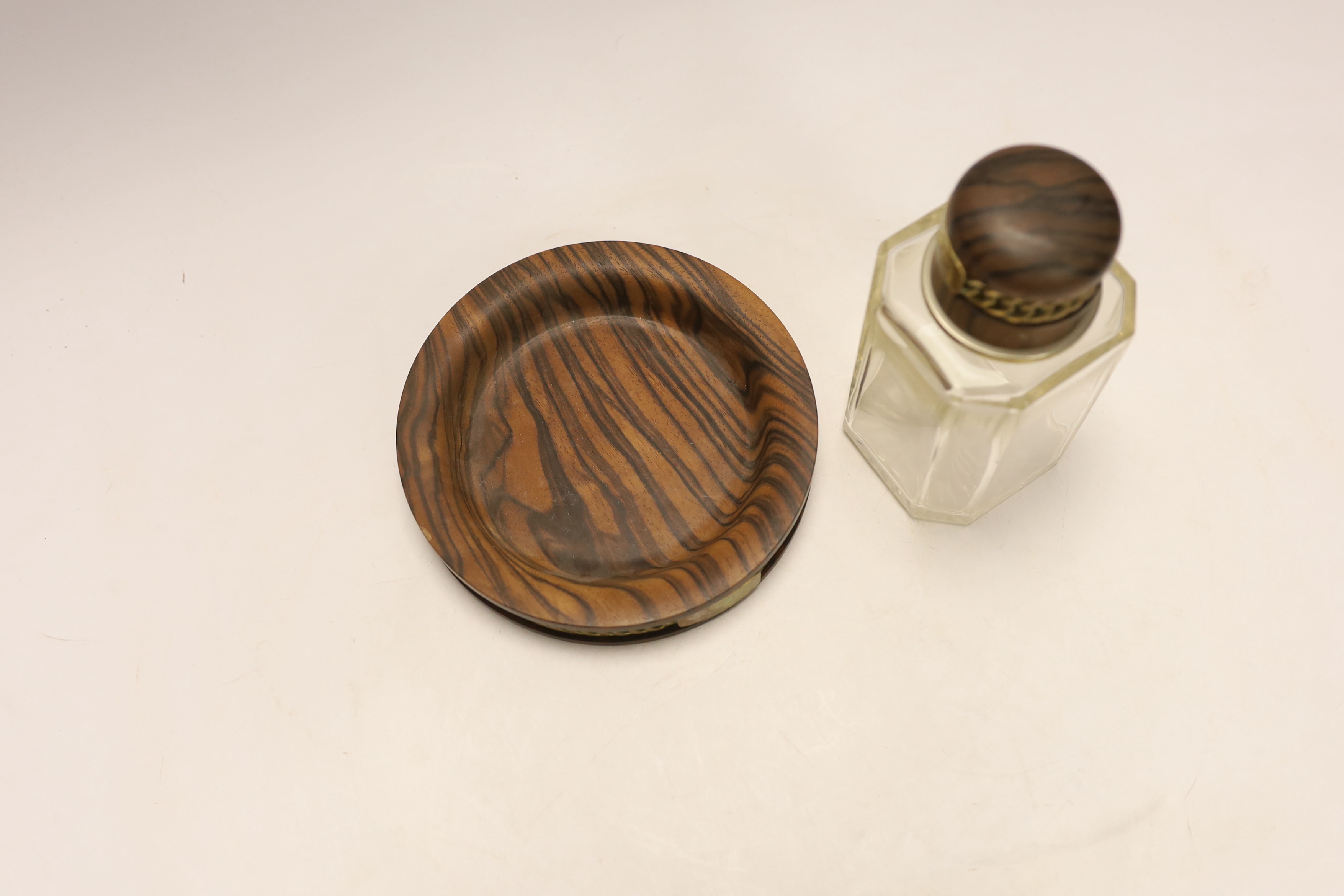 A Hermes scent bottle, 15cm high, and a zebra wood coaster